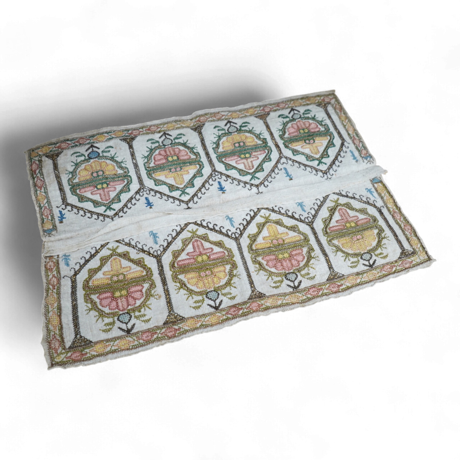 Two 19th century Turkish hand embroidered towel ends sewn together later as a table centre. Worked on fine hand woven linen in polychrome silks with gold metallic thread fillings, 39.5cm wide x 26.5cm deep. Condition - t